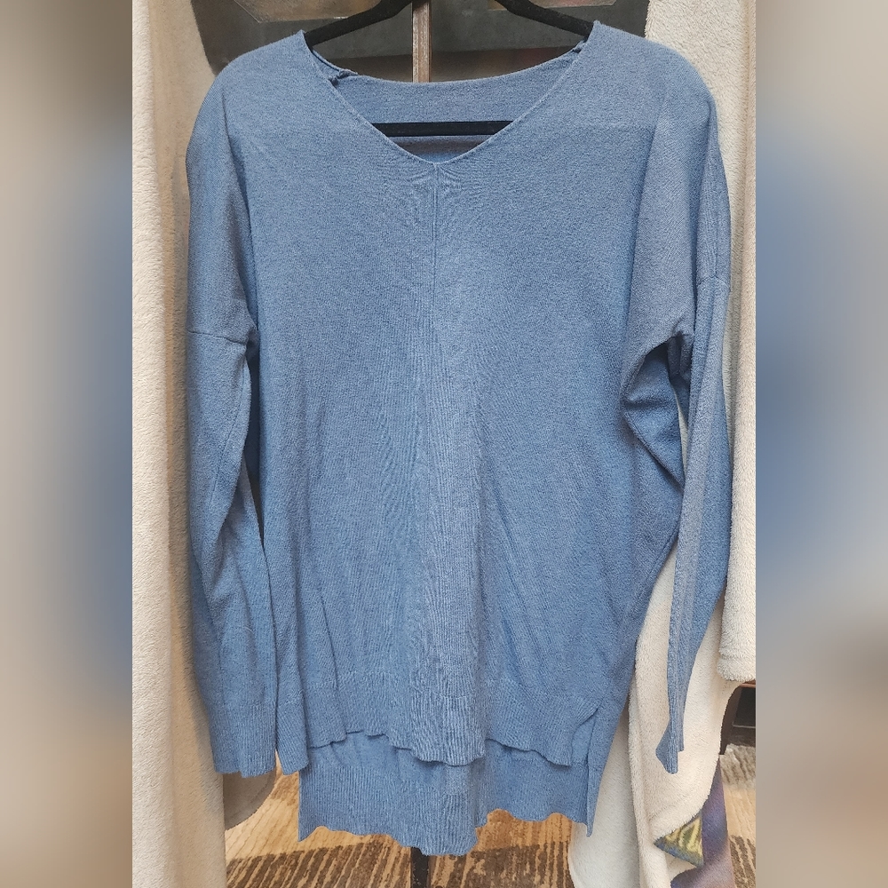 Boutique light blue dolman sweater size L.
